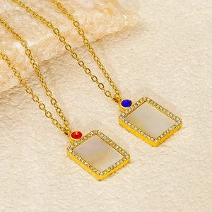 Golden stainless steel shell pendant necklace with zircon halo and colorful gemstone accents