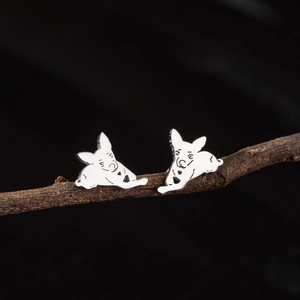 Cute dog stud earrings in silver finish with black engraved animal details