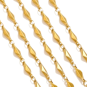 Detailed macro view of gold geometric rhombus link chain for jewelry making