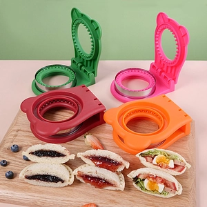 Set of 4 bear-shaped sandwich cutters and sealers in green pink red and orange colors