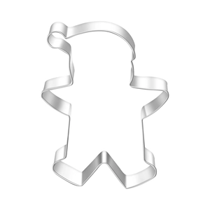 Close-up of a stainless steel gingerbread man cookie cutter with a festive Christmas hat