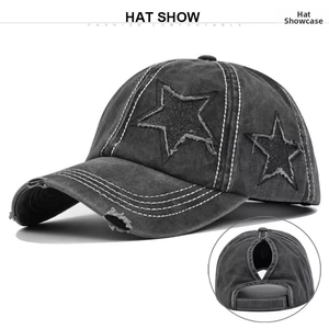 Close-up of distressed cotton baseball cap with glitter star patch and ponytail slot