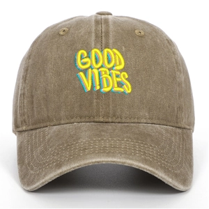 Detail of Good Vibes 3D embroidery on washed cotton vintage baseball cap in brown