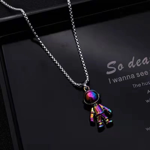 Astronaut pendant necklace with rainbow plating on a silver box chain for couples