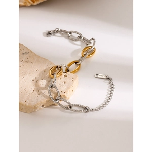 Two-tone 18k gold and silver stainless steel bead bracelet on natural stone base