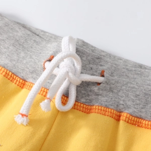 Kids casual shorts with grey and yellow color-block design and white drawstring detail