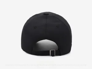 Detail view of the black baseball cap back with adjustable metal buckle and cotton texture