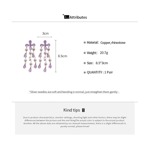 Detailed size and material specifications for purple crystal tassel earrings with silver needles