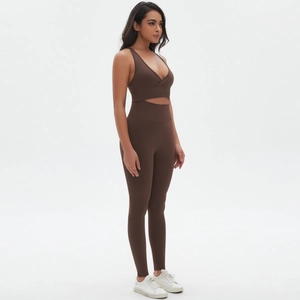 Deep brown seamless yoga set featuring cross-over sports bra and high waisted leggings