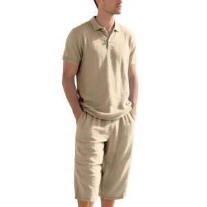 Close-up of khaki linen fabric texture on men's summer polo shirt and cropped pants