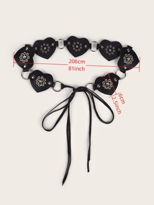 Detail of black heart-shaped leather belt with star rivets and tie-up design 206cm