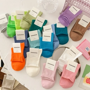 Colorful combed cotton socks for women in minimalist candy colors with rolled edges