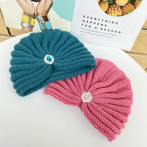Knitted bohemian turban hats with sparkling rhinestone in pink and teal blue colors