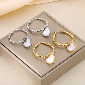 Boucles d'oreilles cœur en or 18 carats et argent avec anneaux torsadés chic