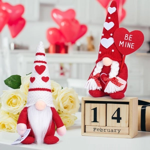 Close-up of Valentine gnome set with Be Mine heart sign and wooden calendar decor