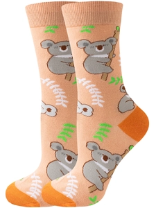 Detail of light orange knit crew socks with gray cartoon koala pattern and orange heels