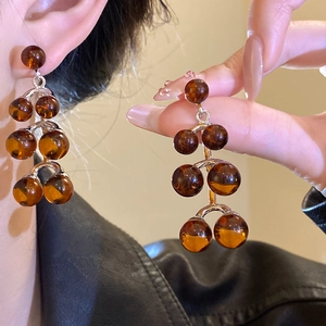 Vintage amber resin drop earrings with silver pins for women in stylish round shape