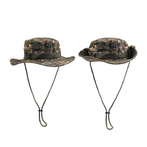 Detail of digital camo boonie hat featuring tactical webbing and adjustable chin cord