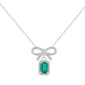 S925 silver necklace with a green emerald bow pendant and sparkling clear stones