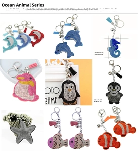 Detailed grid of rhinestone marine animal keychains like seahorses with colorful tassels