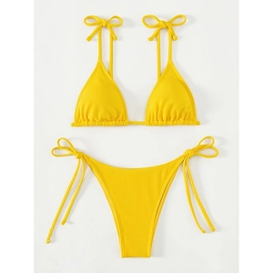 Solid bright yellow ribbed bikini set with adjustable halter top and tie-side bottoms