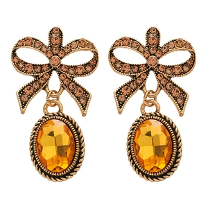 Vintage style bow knot earrings with amber oval gemstones and rhinestones in gold finish