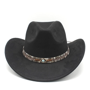 Detail of black felt cowboy hat featuring woven band and evil eye charm decoration
