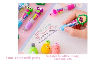 Detail of four-color retractable ballpoint pen with cute cartoon owl character topper