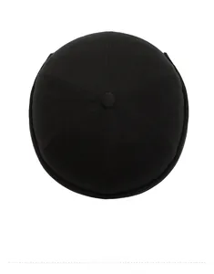 Top view of black brimless docker hat showing six-panel cotton fabric and top button