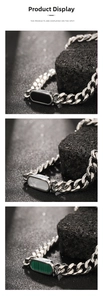 Macro view of Cuban chain necklaces with black, white, and green shell inlays on stone