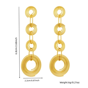 Elegant gold multi-layered spiral hoop earrings with long teardrop tassel pendants
