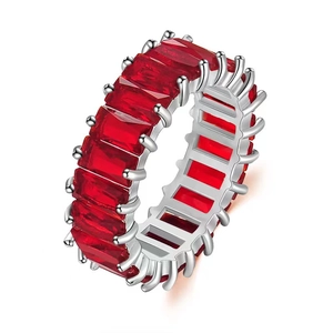 Luxurious silver eternity ring featuring a full circle of rectangular red zircons