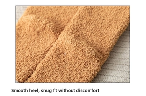 Detailed close-up of smooth heel design on warm ginger coral fleece winter socks