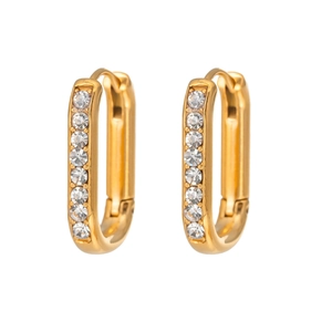 Detail of gold U-shaped earrings with clear crystals and a polished snap closure