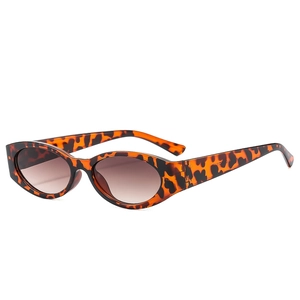Y2K vintage leopard print oval cat-eye sunglasses with gradient brown lenses