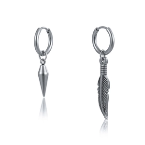 Detailed macro view of silver stainless steel earrings with feather and cone shaped charms