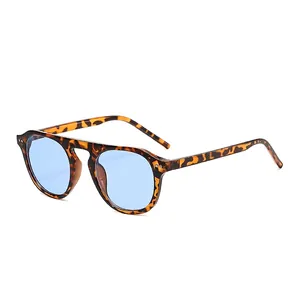 Retro tortoiseshell round frame sunglasses with light blue lenses for a trendy look