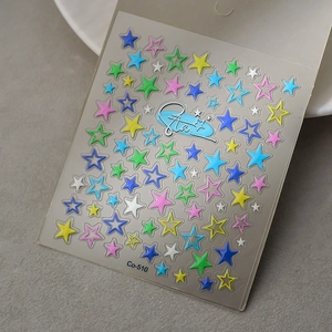 Close-up of 3D colorful star nail art stickers with metallic edges on Co-510 sheet