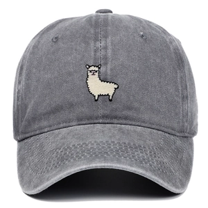 Close-up of sheep embroidery and washed canvas texture on dark gray vintage baseball cap