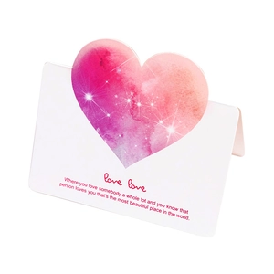 Minimalist white heart greeting card with pink glitter heart and love text