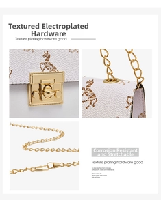 Close-up of white textured leather bag with horse carriage print and gold hardware
