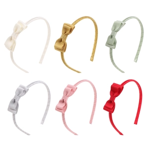 Set of six colorful girls bow headbands in soft ribbed fabric and assorted pastel colors