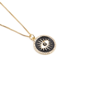 Golden Evil Eye pendant necklace with enamel detail and zircon accents on a box chain