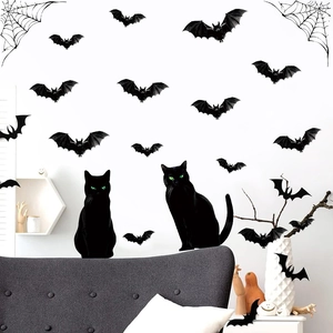 Halloween wall stickers set featuring black cats, bats and spider webs on white wall
