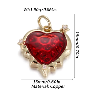 Detail view of red heart pendant with size specs 18mm height and 15mm width in copper