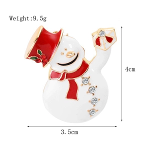 Detailed view of enamel snowman brooch with red scarf and rhinestones, 4cm height