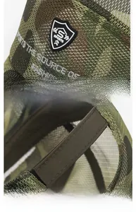 Detail of shield-shaped S SPORTS embroidery and adjustable strap on camo mesh trucker hat