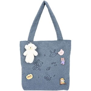 Blue fuzzy fleece tote bag with cute cartoon patches and a plush bear pendant
