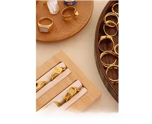 Collection of vintage 18K gold plated rings with irregular textures and shell inlays