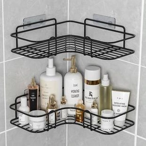 Detail of two-tier black metal corner shower shelves with adhesive mounting and bottles